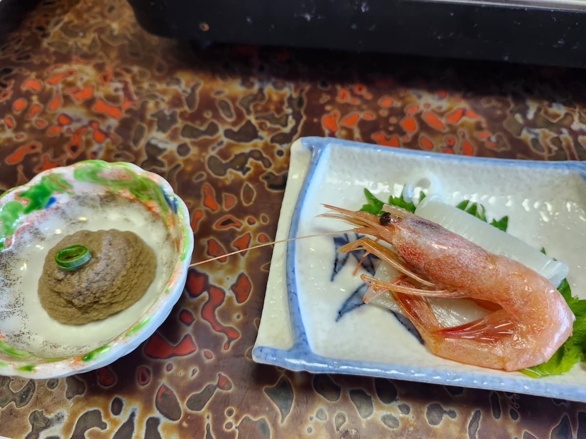 「JRかにカニエクスプレス」で行った竹野 寛さんの蟹みそと海老いかの刺し身