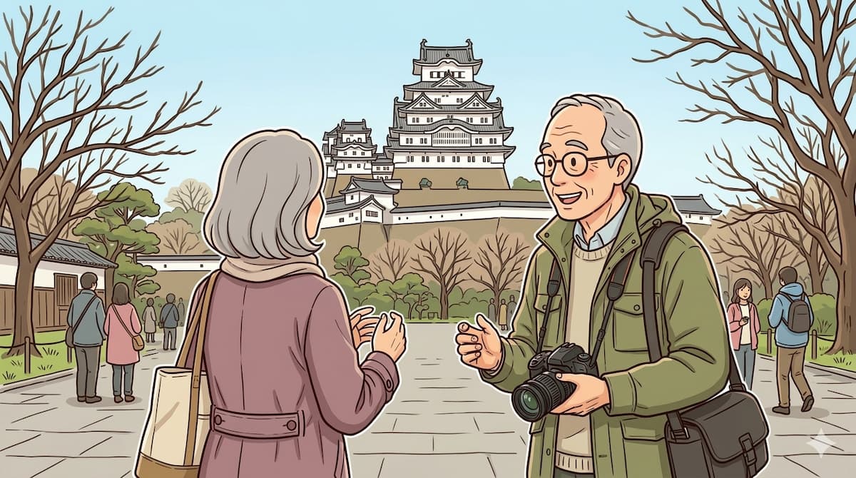 姫路城の前でカメラを持った笑顔のおじいさんに話しかけられる女性の様子